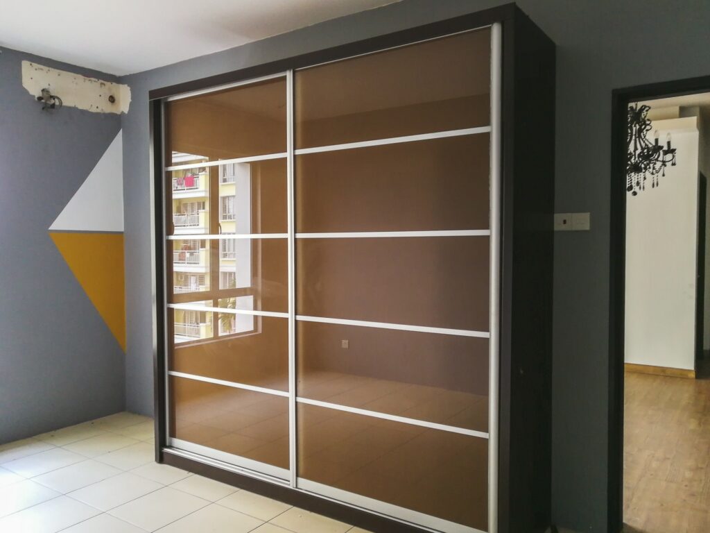 glass slider cupboard in an empty room